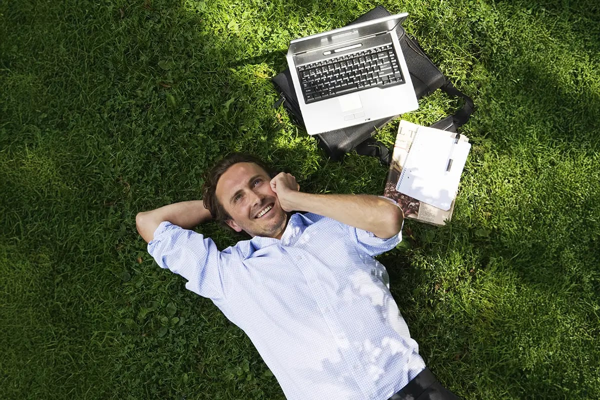 man_lying_on_lawn